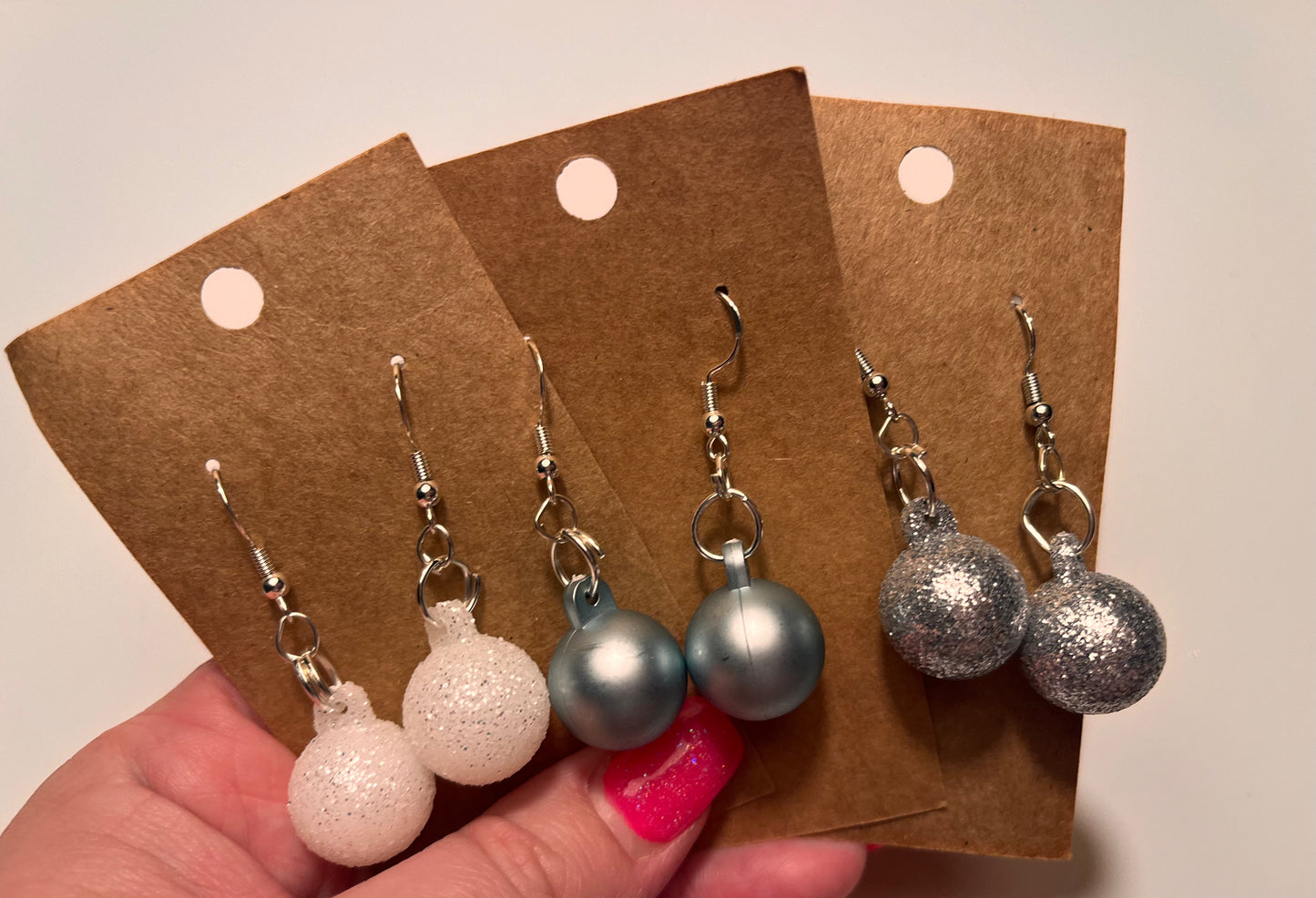 Snowy bulb ornament dangle earrings