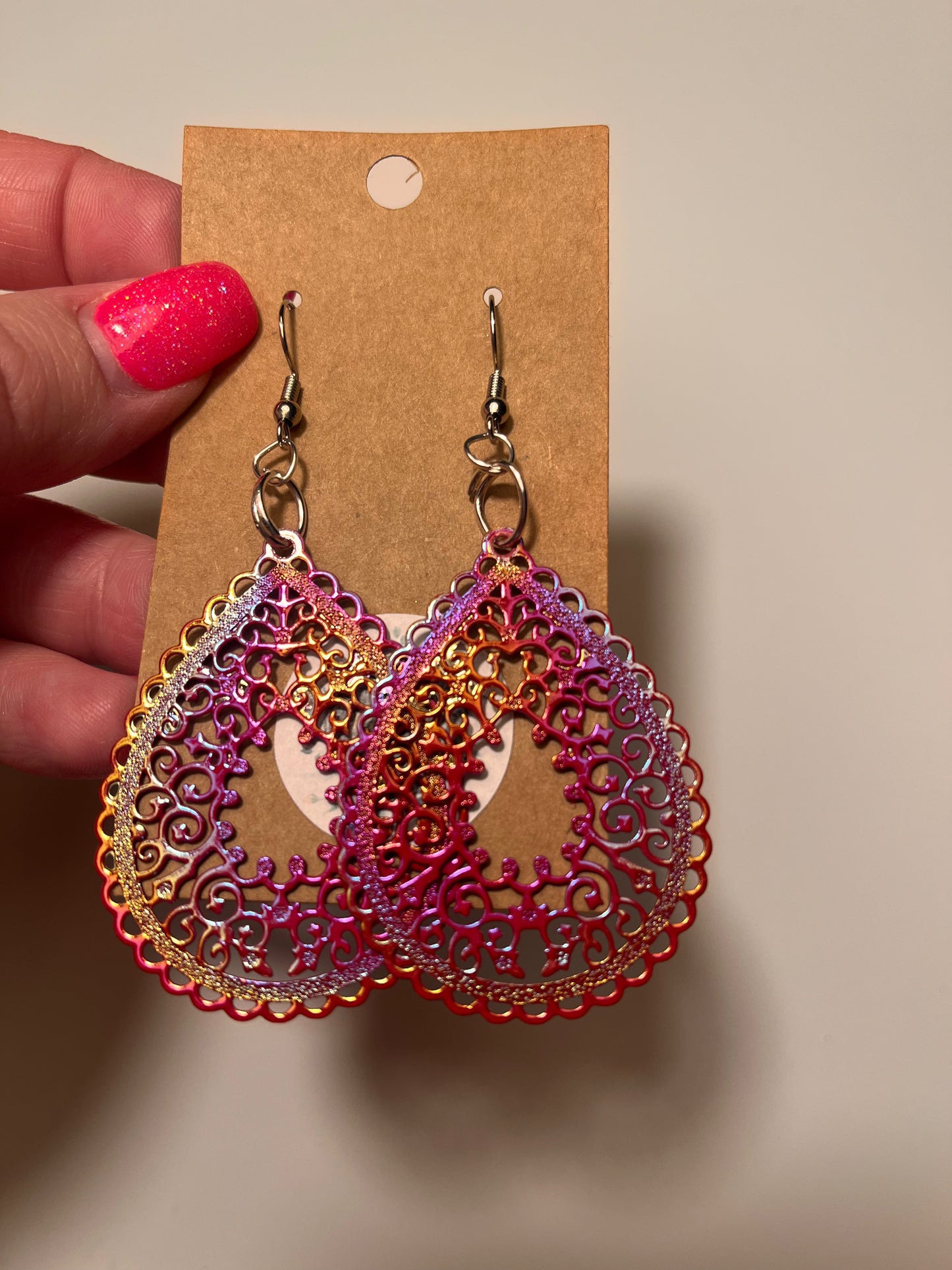 Iridescent red filigree dangle earrings